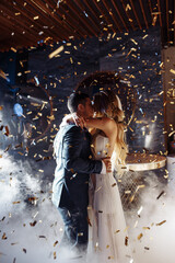 First dance. The groom is dancing with the bride. A significant day.