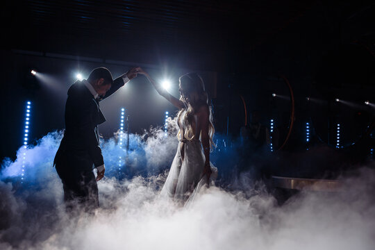 First dance. The groom is dancing with the bride. A significant day.