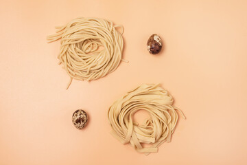 Handmade Raw Noodles and Eggs on Yellow Background Horizontal Top View Italian Pasta