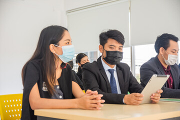 Group people wear face mask protect covid19 coronavirus in meeting room
