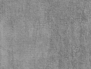 Gray cement plaster wall as background or texture.