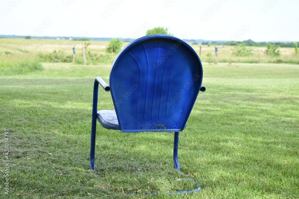 Sticker lawn chair in a yard