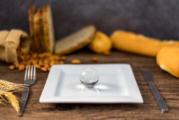 Globe model placed on plate with fork spoon for serve menu on breakfast table. Earth on plate, Ready for eat. International cuisine is practiced around the world. World food inter concept
