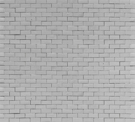 Gray bricks close up. Texture of concrete wall. Fence made of concrete blocks.