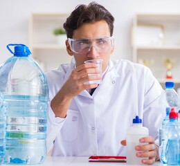 Lab assistant testing water quality