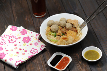 Indonesian food, mie ayam, noodles with chicken and served with meatballs