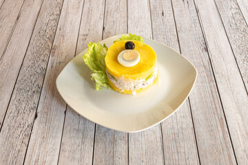 recipe for a typical causa limeña from Peru with its black olive on top