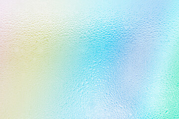 Waterdrops on blue purple green Rainbow gradient background. Rainbow background with soft light...