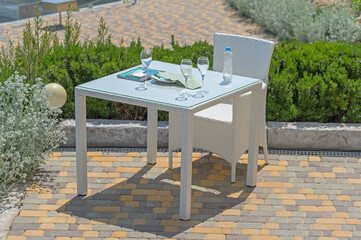 chairs and tables in the summer cafe
