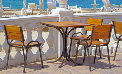 Summer terrace cafe on beach of ocean