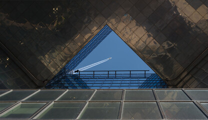 plane flying through space in building