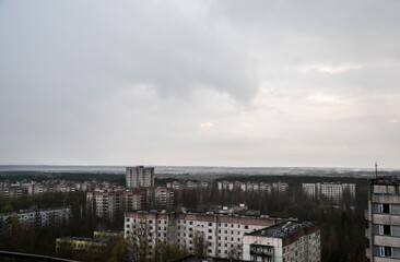 Fototapeta na wymiar Panoramic view of abandoned residential buildings inside the Chernobyl Exclusion Zone, Pripyat, Ukraine