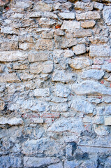 Ancient stone wall. Seamless texture of medieval stone wall. Old castle stone wall texture background. Part of a stone wall, for background or texture. Zbarazh castle, Ukraine
