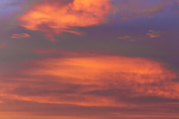Fototapeta na wymiar Red-gray overcast sky before a thunderstorm. Sunny sunset. Backgrounds