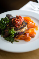 Close up of fish dish with vegetables