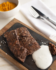 Meat and mushed pumpkin