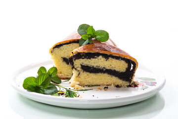 roll with poppy seeds inside on a white background