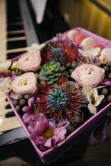 Beautiful stylish wedding bouquet close-up in a festive box. Wedding Floristics