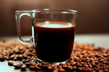 cup of coffee on a wooden black table. High quality photo