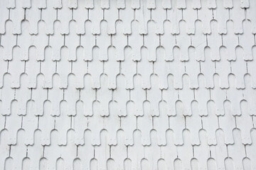 Fototapeta premium White vintage wooden facade tiles. Exterior panels. Old texture