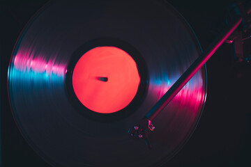 Close up of turntable playing vinyl record - obrazy, fototapety, plakaty
