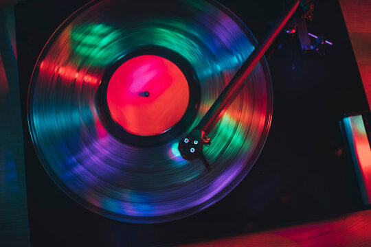 Turntable play vinyl record with light show effects