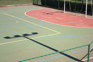 Multifunctional court, basketball backboard shadow.