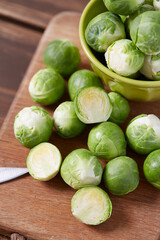 cabbage sprouts on wooden surface