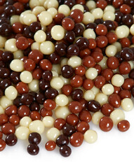 chocolate candies (crunches) isolated on white