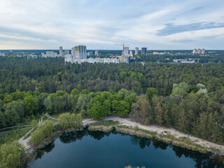 Fototapeta na wymiar Lake in the park in spring. Aerial drone view.