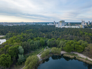 Lake in the park in spring. Aerial drone view.