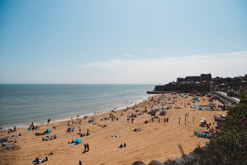 Beautiful sand beach in East England with wooden beach huts