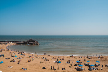 Beautiful sand beach in East England with wooden beach huts