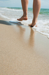 feet on the beach