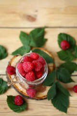 Fresh raspberries, raspberry leaves.
