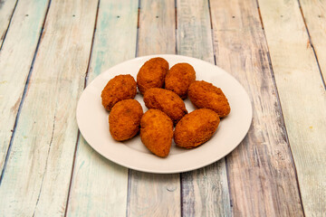 Spanish tapa of homemade serrano ham croquettes