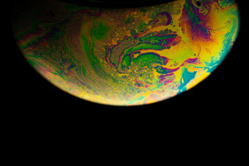 Soap bubble. Abstract galaxy background with globe planet earth in universe space with sunlight on dark background. Concept of apocalypse, armageddon, doomsday.