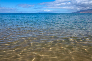 Tropical beach scene. Sea view from summer beach with sky. Coastal landscape.