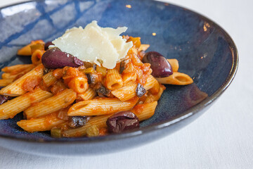 pasta rolls mixed vegetable sauce dish olives