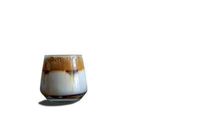 a glass of cold coffee with milk