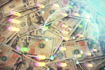 Double exposure of world map drawing over us dollars bill background. International concept.