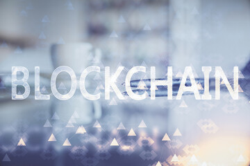 Double exposure of crypto currency theme drawing hologram over coffee cup background in office. Concept of international blockchain.