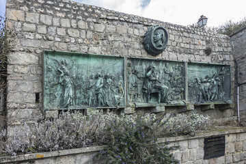 Bronze commemorative plaques monument to Victor Hugo in Paris (1802) that survived during World War...