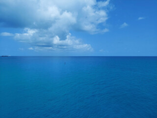Fototapeta premium view of calm blue sea and clear sky