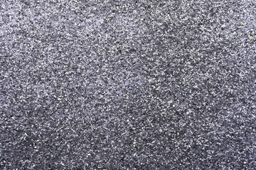 Beautiful shiny grey glitter as background, closeup
