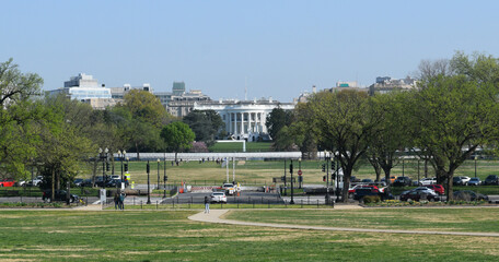 Post January 6, 2021 insurrection barricades and security measures with the White House in the background.