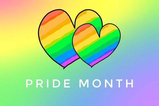 Rainbow heart drawing and texts 'Pride Month'  on blurred rainbow background, concept for lgbtq+ community celebrations in pride month or in June around the world.