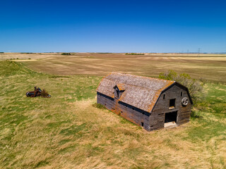 An aerial view of an old barn that was built in the early 1900's by the first farming settlers of the Saskatchewan prairies