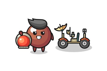 the cute chocolate ball as astronaut with a lunar rover