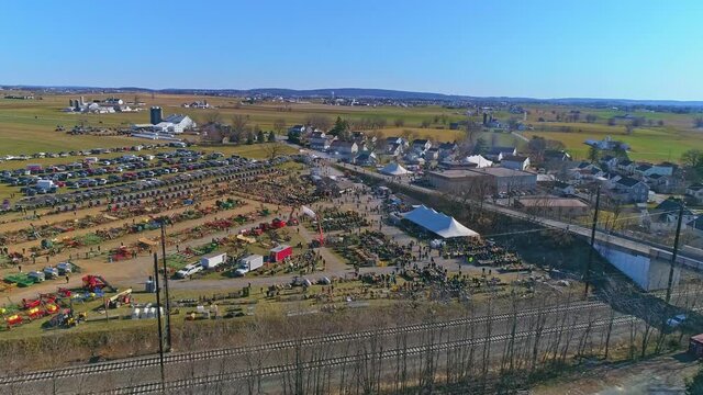 An Aerial View of an Amish Mud Sale in Pennsylvania Selling Amish Products on a Sunny Day